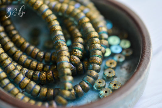 30 Translucent Baby Blue, Etched Metallic Gold, Aurora Borealis Finish, Premium Czech Glass, Heishi Beads 3x6mm.